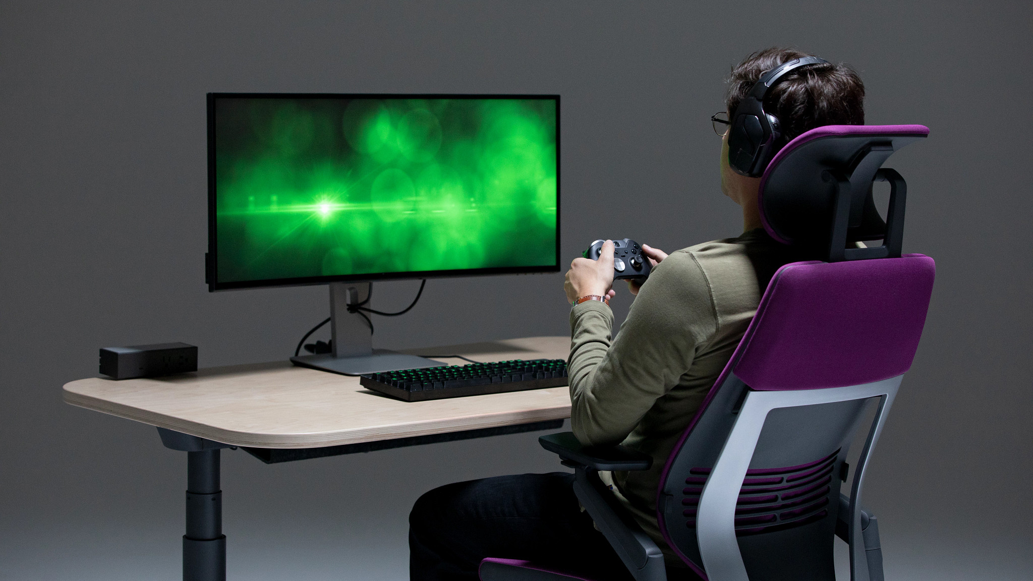 gamer using Steelcase furniture